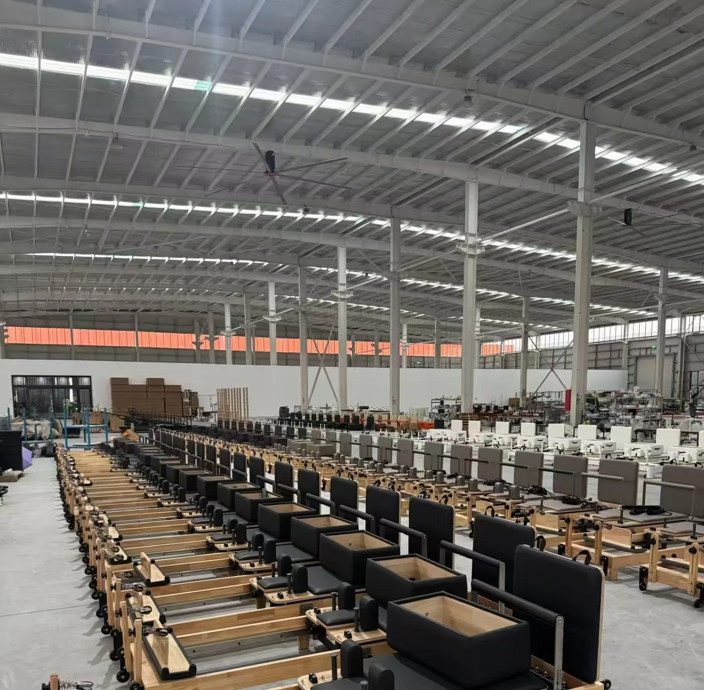Lumina factory floor showing reformers lined up for assembly