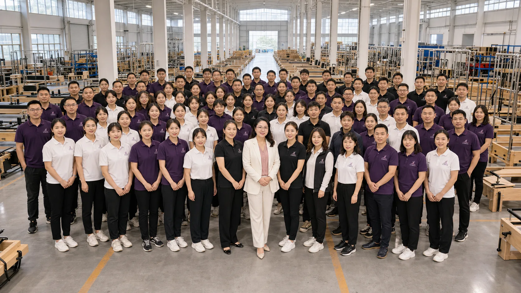 Lumina Chinese Pilates equipment team in the factory workshop